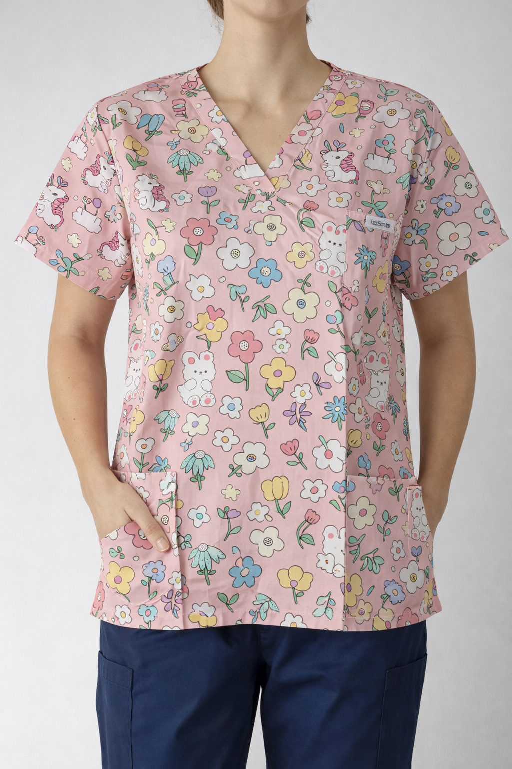 Spring flowers on pink scrub top KazScrubs
