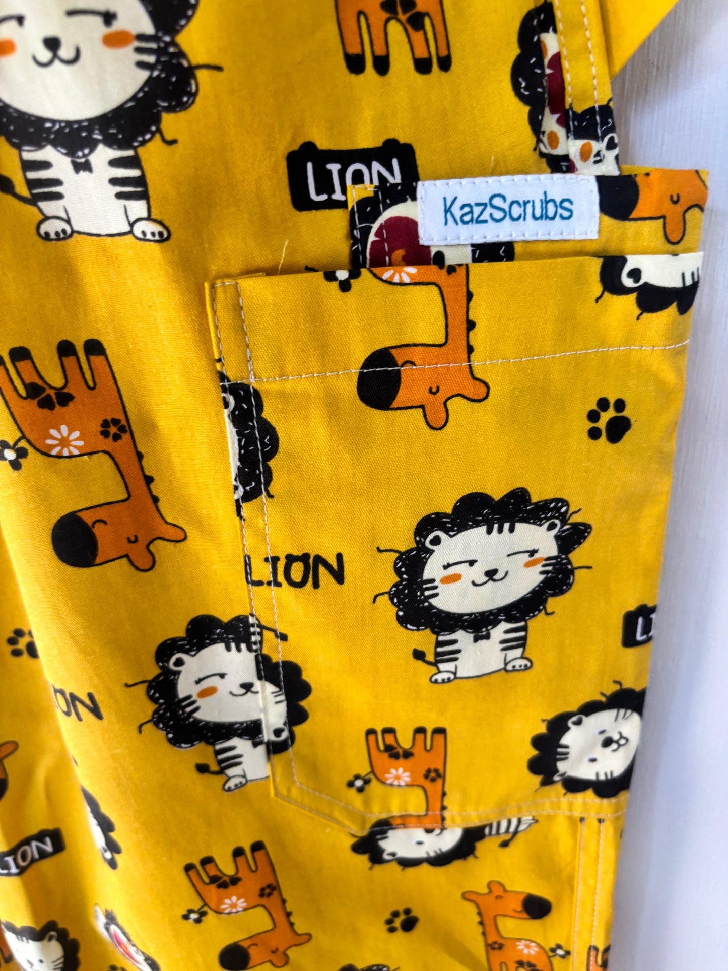 Lion n giraffe scrub sets